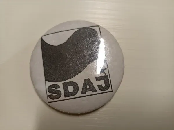 Chapa de la SDAJ de la República Federal de Alemania